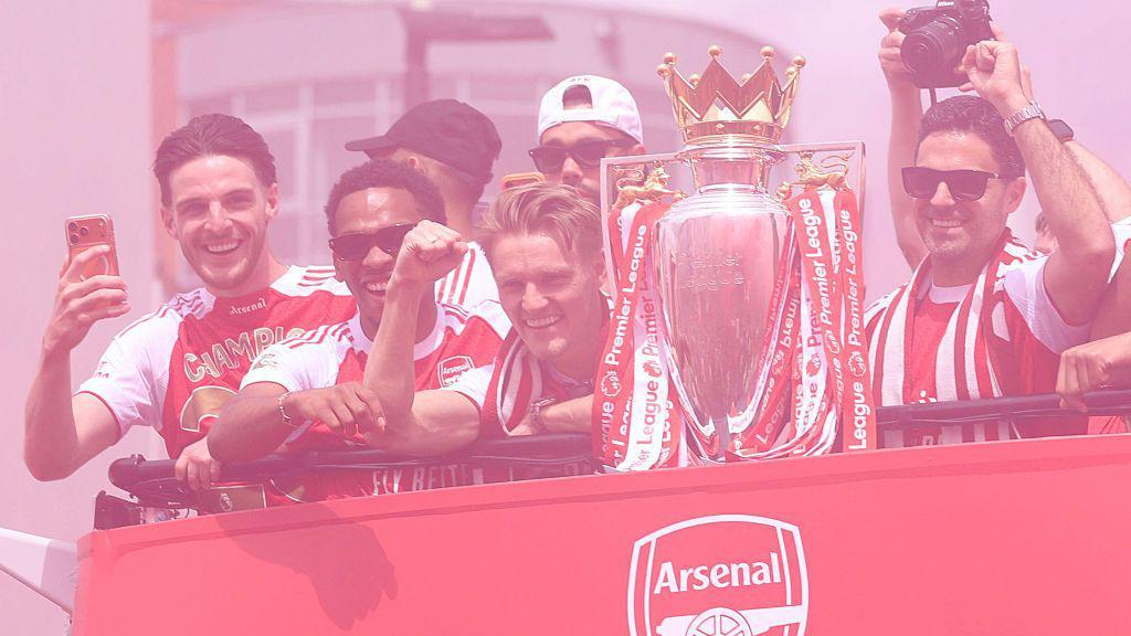Thousands of fans watch on as Arsenal celebrate Premier League win with open-top bus parade