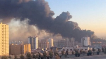 Israel attacks security headquarters across Tehran, as Iran hits US sites in Dubai and Qatar