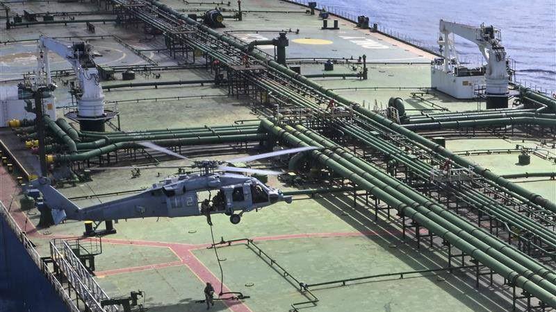 US boards ship carrying Iran oil as Trump threatens mine-laying vessels