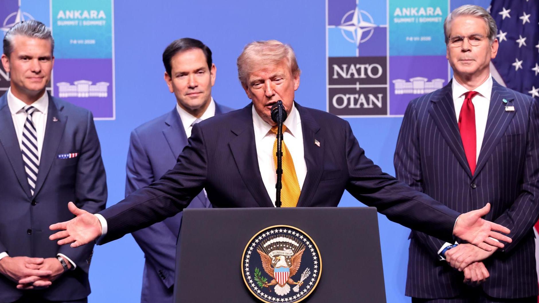 Trump threatens Iran and says truce is over, as Iranian official warns of regional retaliation