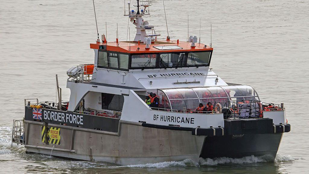 More than 150 migrants rescued after boat catches fire in Channel