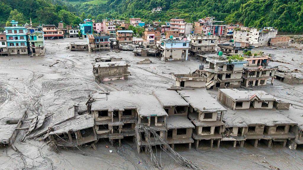More than 800 missing in Nepal as authorities say glacial collapse triggered flash flood