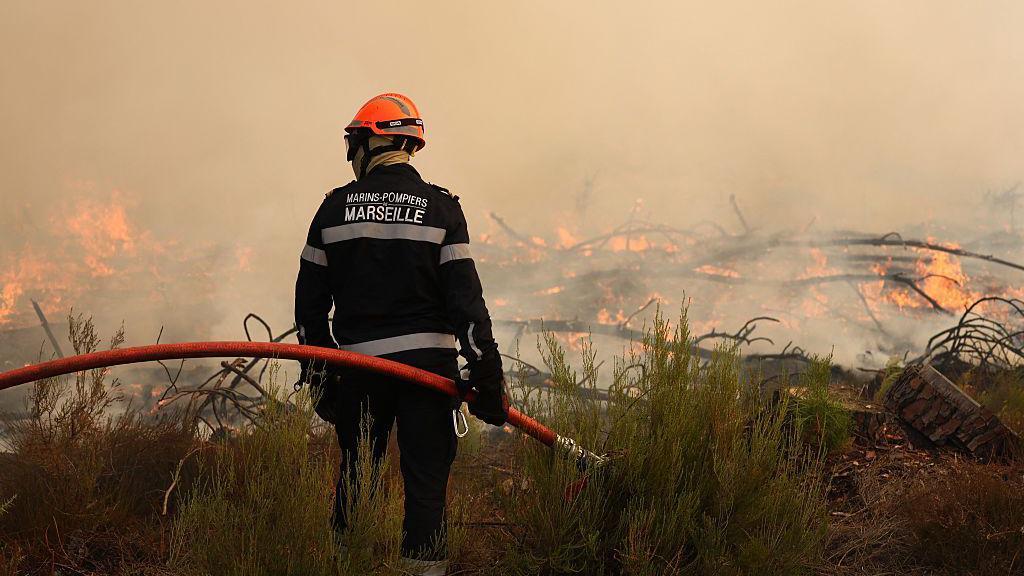 Firefighters battle wildfire as tens of thousands evacuated near Bordeaux