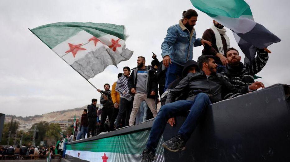 Syria marks year since dramatic fall of Assad