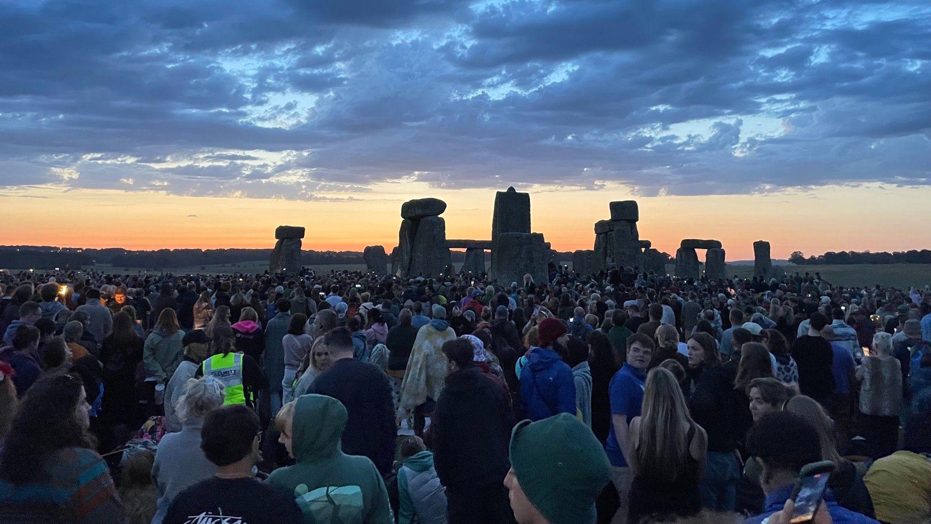 Summer solstice celebrations begin as parts of UK faces 34C heat on longest day of year 