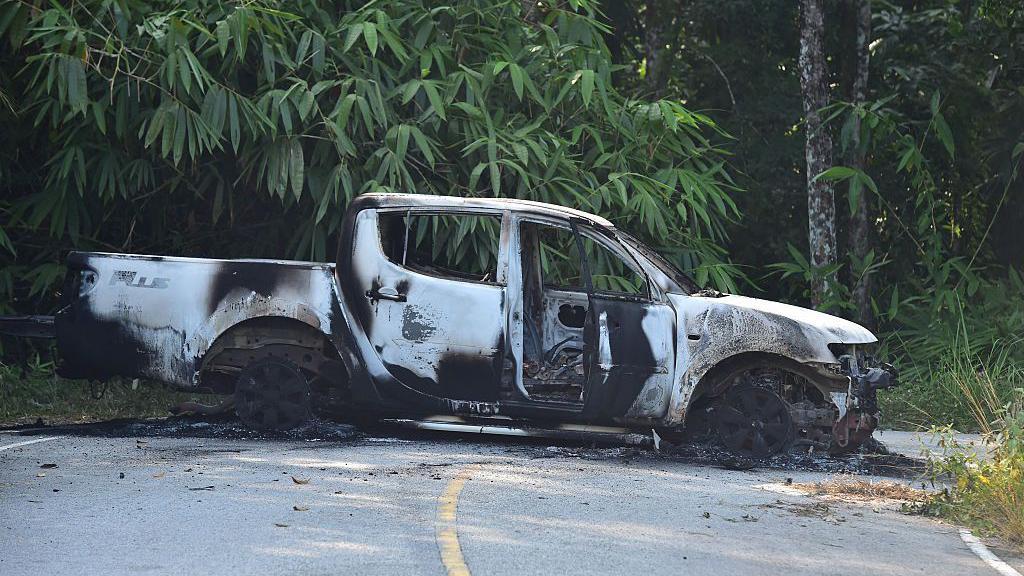 Dozens of co-ordinated arson attacks hit southern Thailand