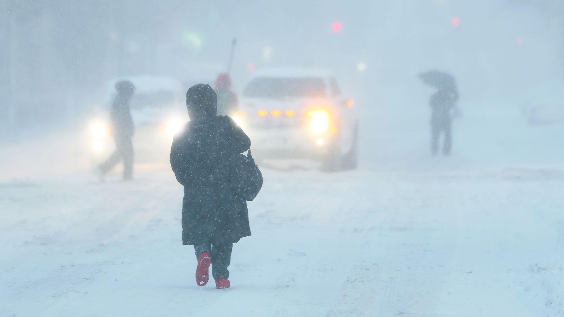 Fifteen inches of snow falls in New York as major snow storm blasts US north-east