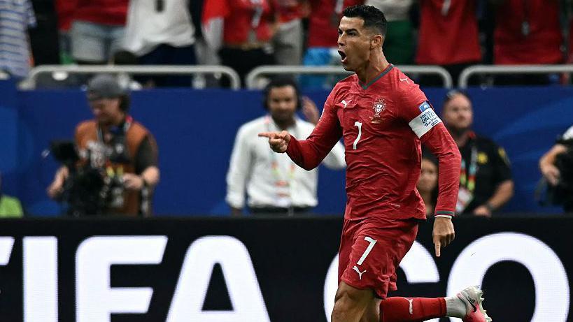 Ronaldo gives Portugal lead and becomes first to score in six World Cups