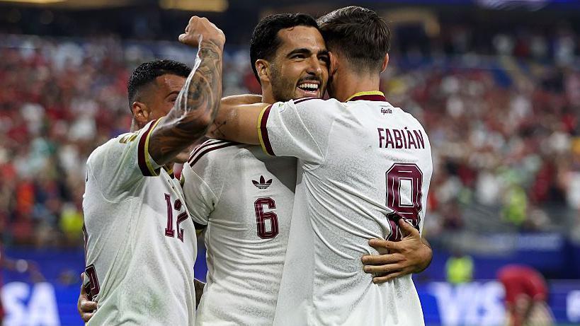Substitute Merino scores late winner as Spain knock out Portugal