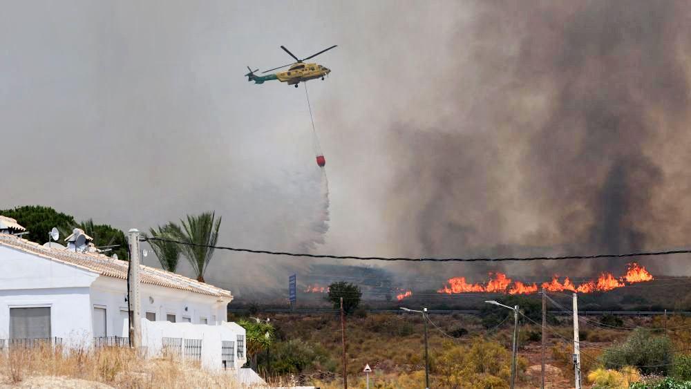 Twelve dead and 23 missing in Spain wildfire as crews battle to contain blaze
