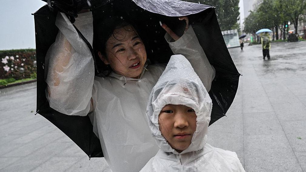 Three storms strike Asia in a week battering millions with heavy rain and strong winds