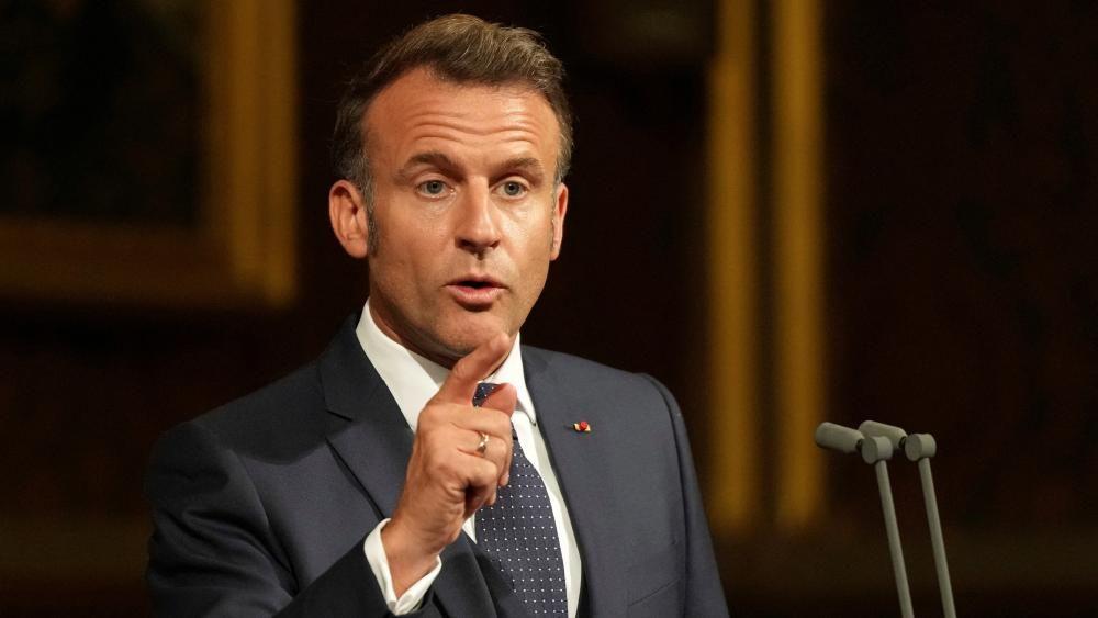 UK and France have duty to 'firmly' tackle illegal migration, Macron tells Parliament