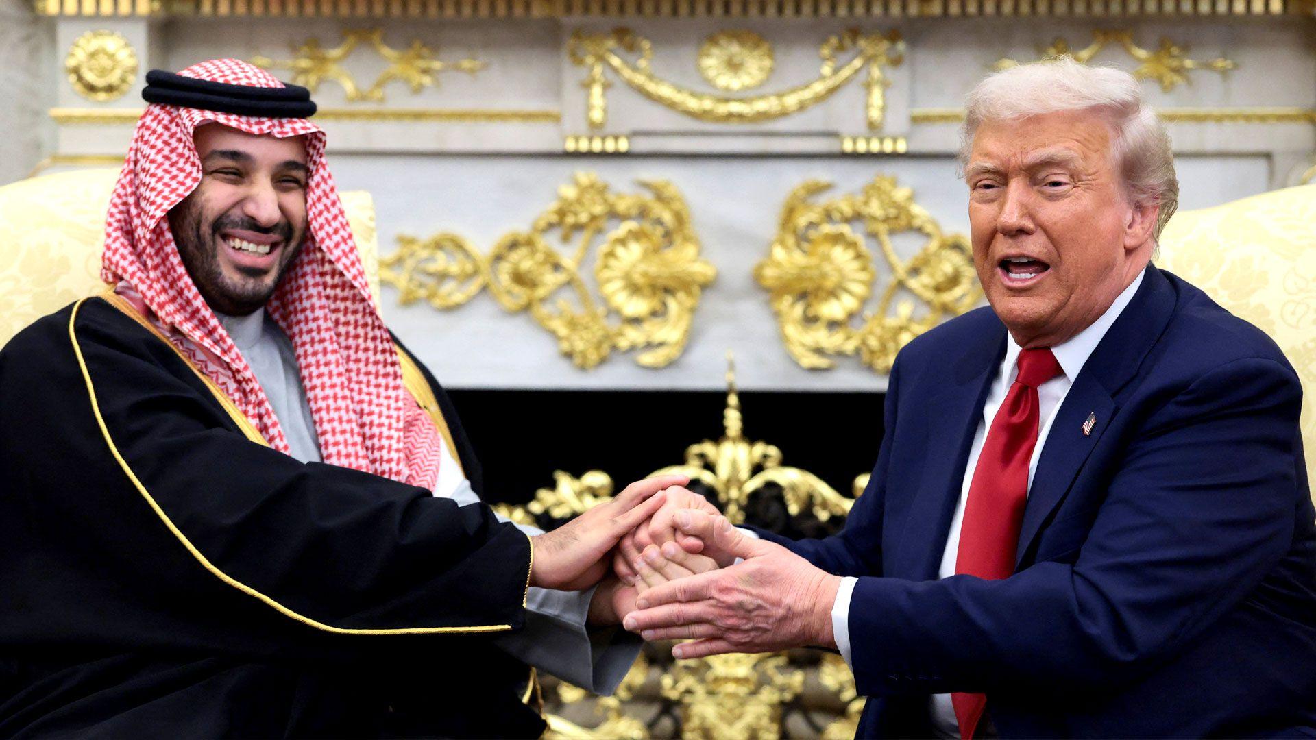 Trump defends Saudi crown prince over killing of journalist as they hold talks in Washington