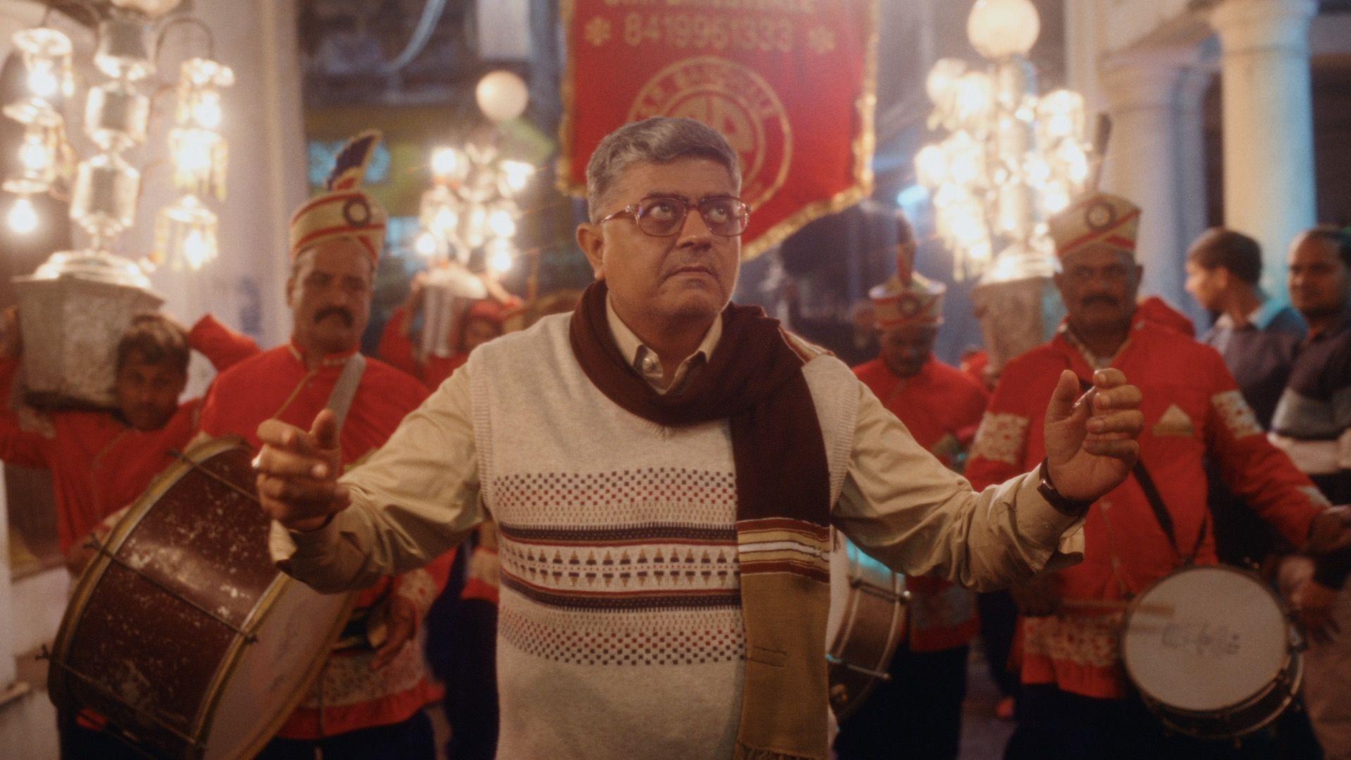 Actor Gajraj Rao leads a wedding band in a scene from the film Band Baaja Bitiya