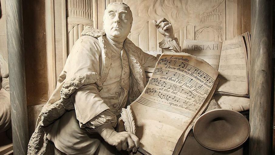 Monumento funerario de Handel donde se le ve escribiendo el Mesías.