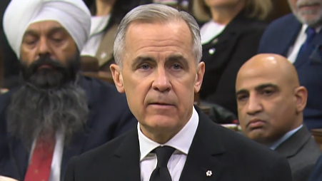 Canada mourns with you, tearful PM Carney tells town where nine killed in shootings