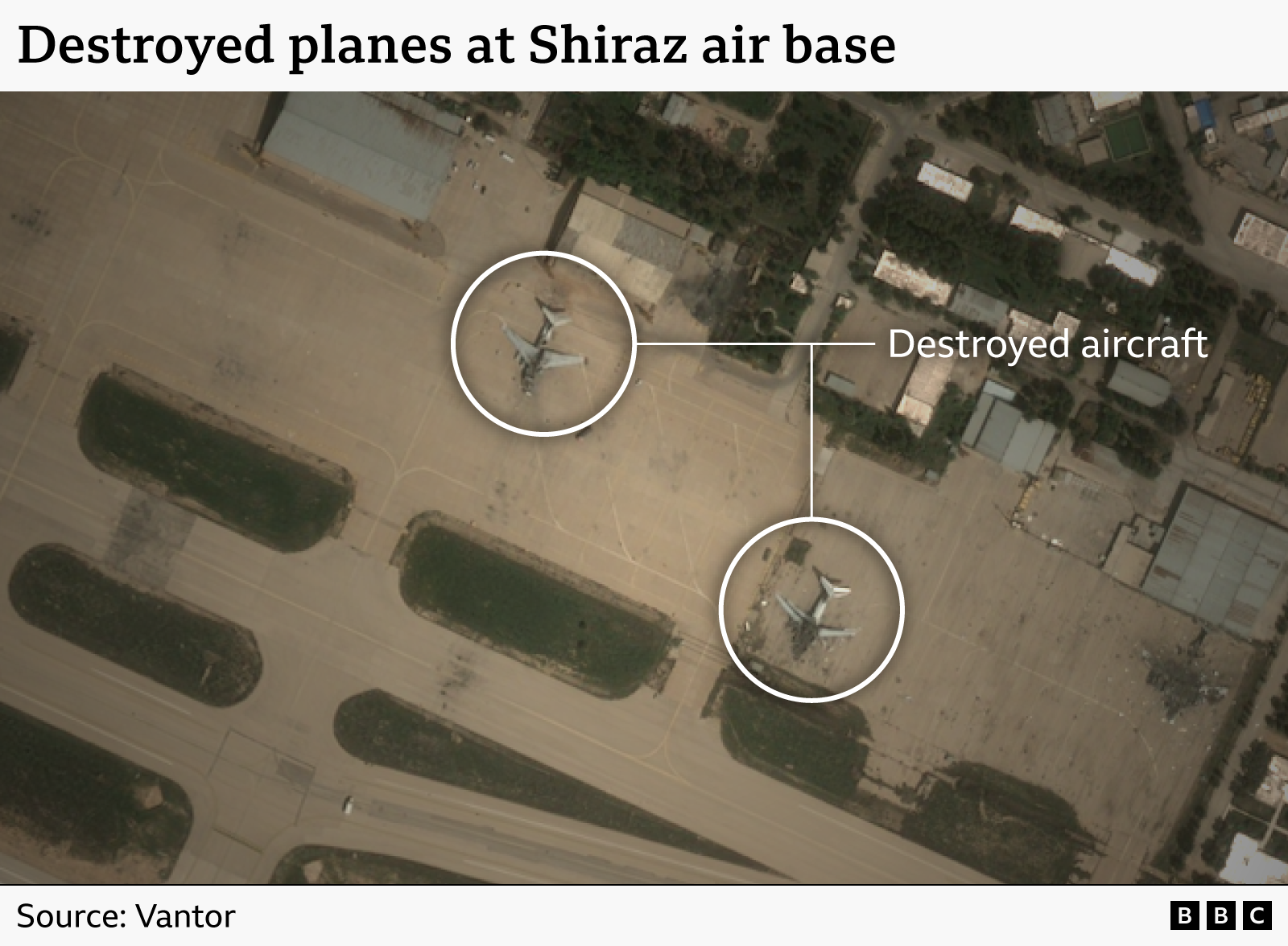 A satellite image showing damage to aircraft at Shiraz air base. The photo shows two destryoed planes sitting on the runway.