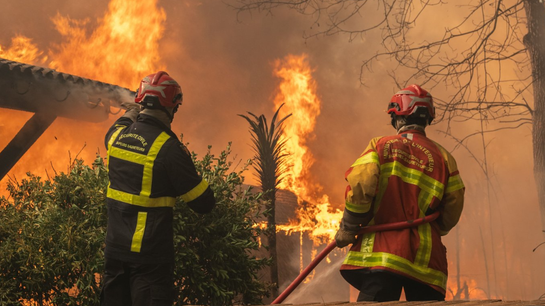 Firefighters battle to contain France and Spain wildfires as thousands more evacuated