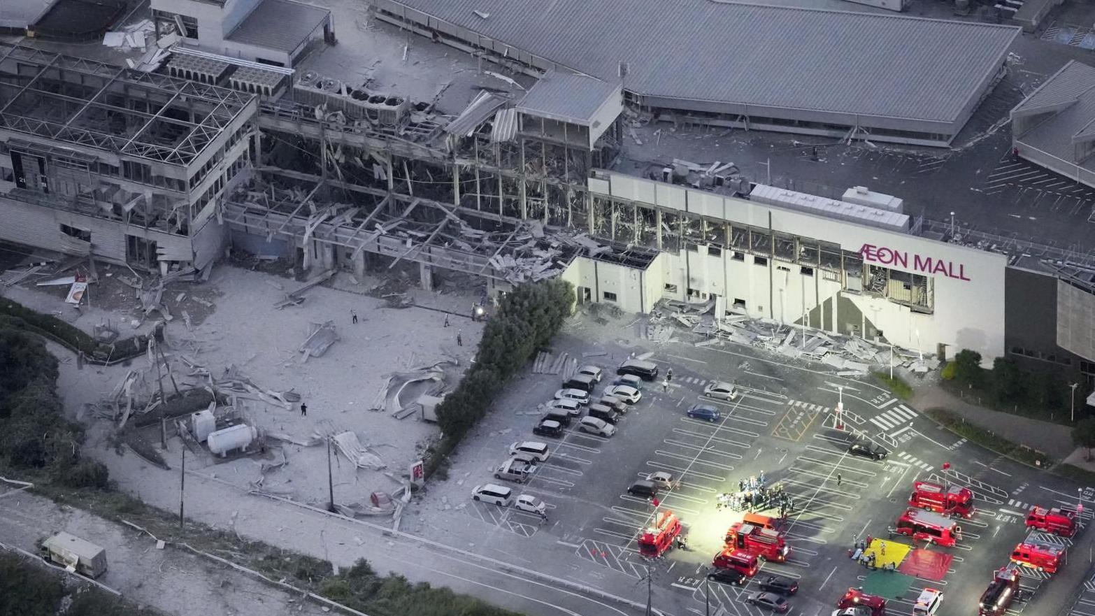 Many people trapped inside Japanese shopping centre after earthquake, fire service says