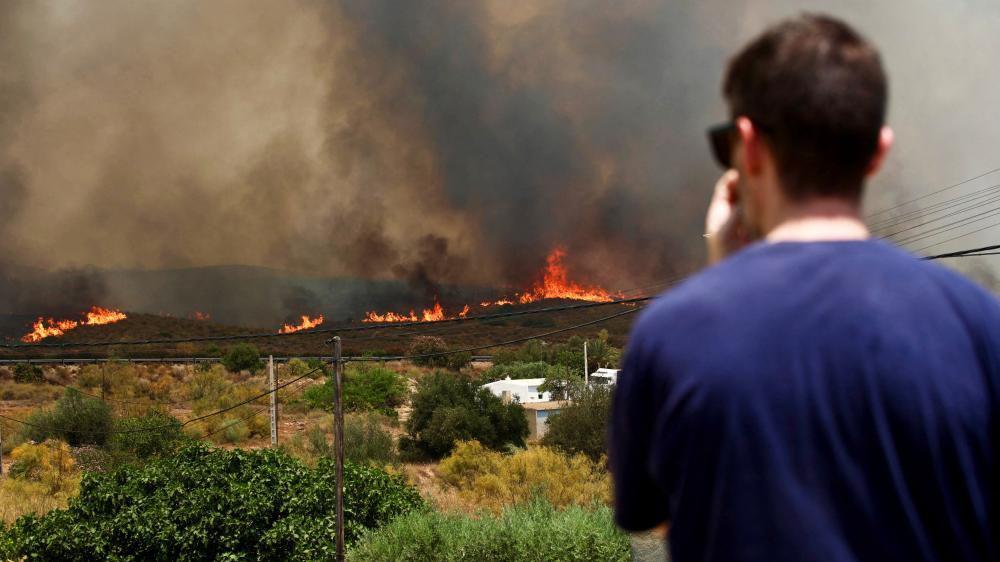 Really frightening, unbelievably quick: Witnesses describe fleeing deadly Spain wildfire