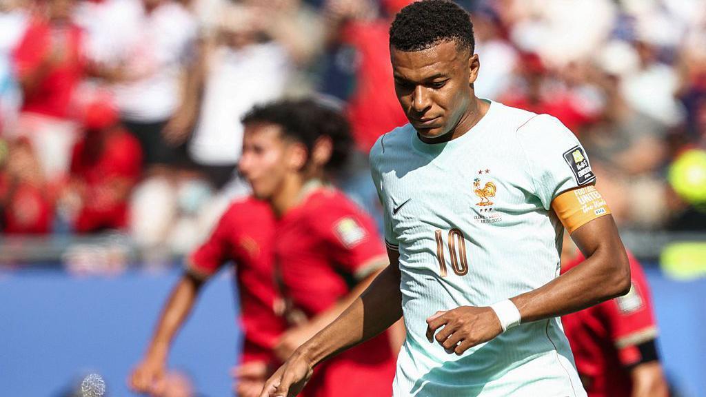 Mbappe penalty saved with France and Morocco goalless