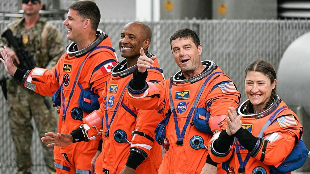 Astronauts arrive at launch pad for first crewed mission around Moon in more than 50 years