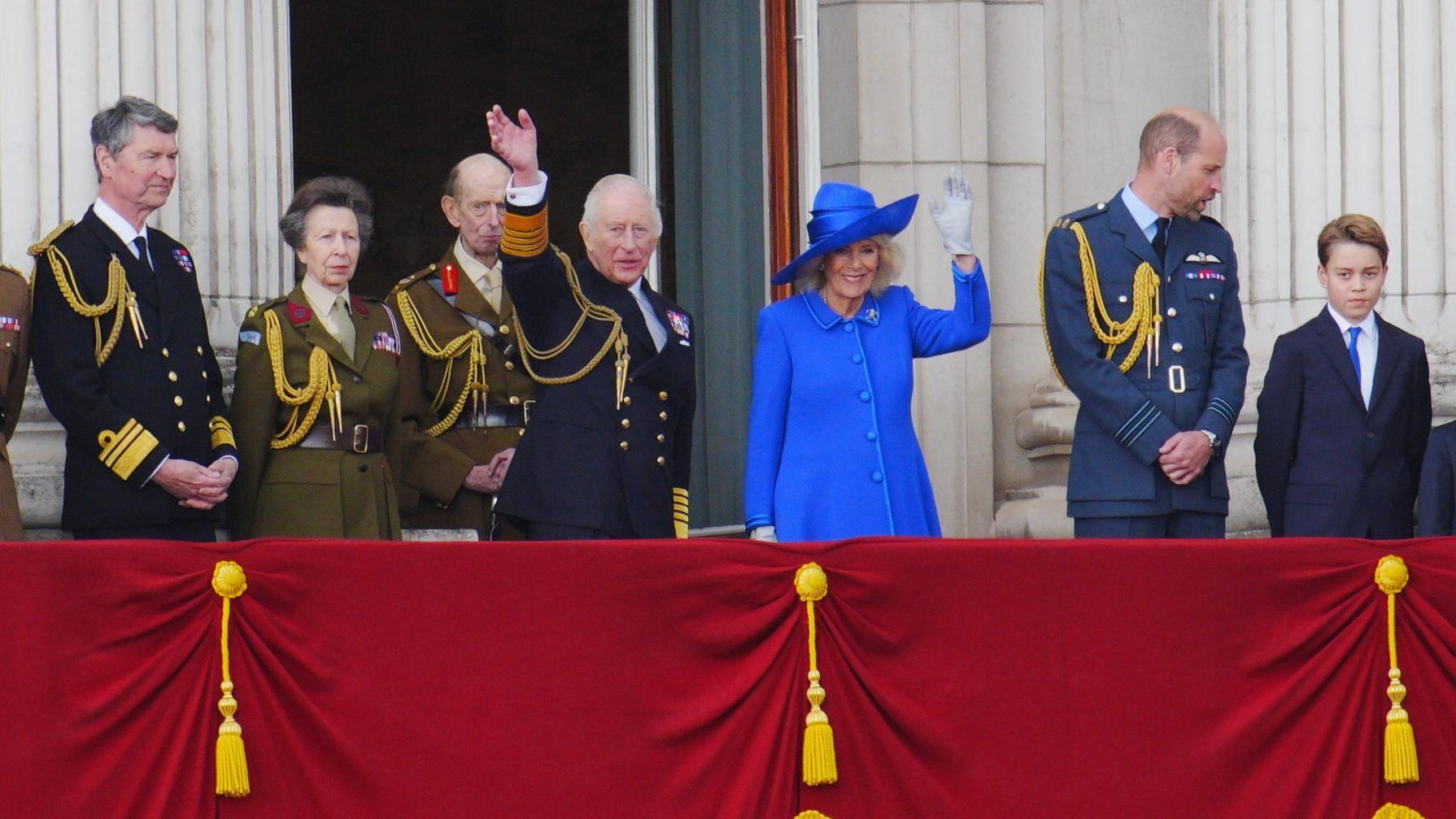 Royal Family watch on as Red Arrows thunder over Buckingham Palace for VE Day flypast