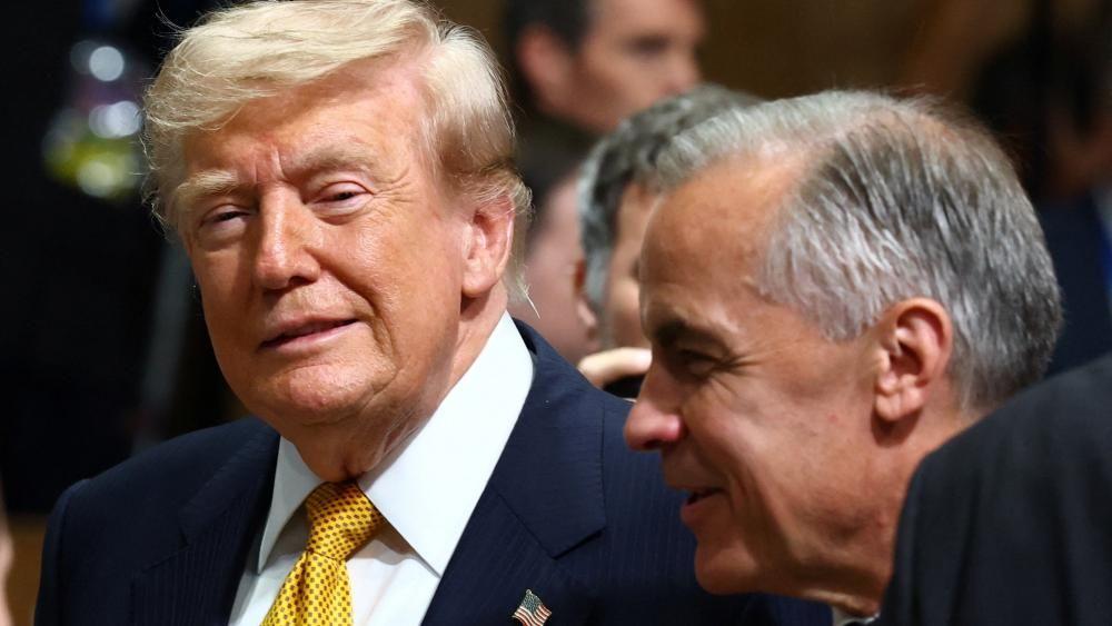 Trump slaps 50% tariffs on Canada and Carney vows to 'intensify' trade talks