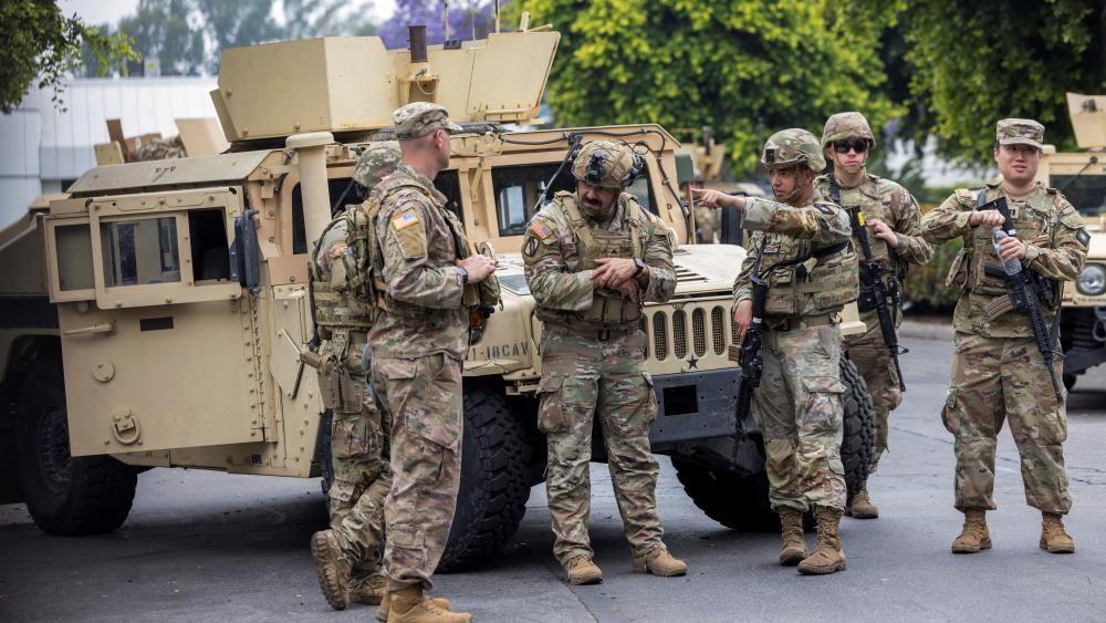 Troops sent by Trump arrive in LA with more immigration raid protests expected 