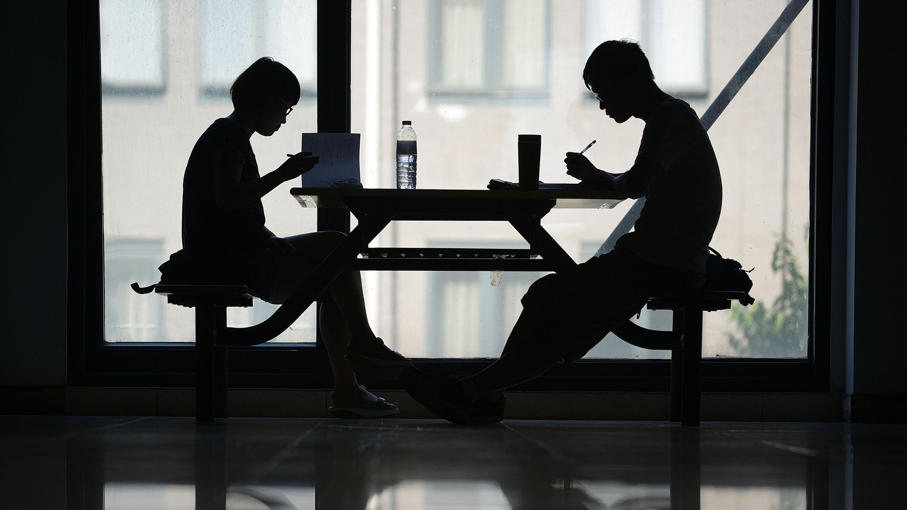 Chinese students study in a building at a university in Beijing on May 30, 2013. 