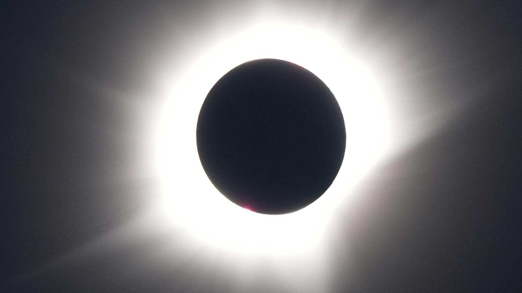 Solar eclipse reaches peak across UK and Europe as millions watch once-in-a-generation event