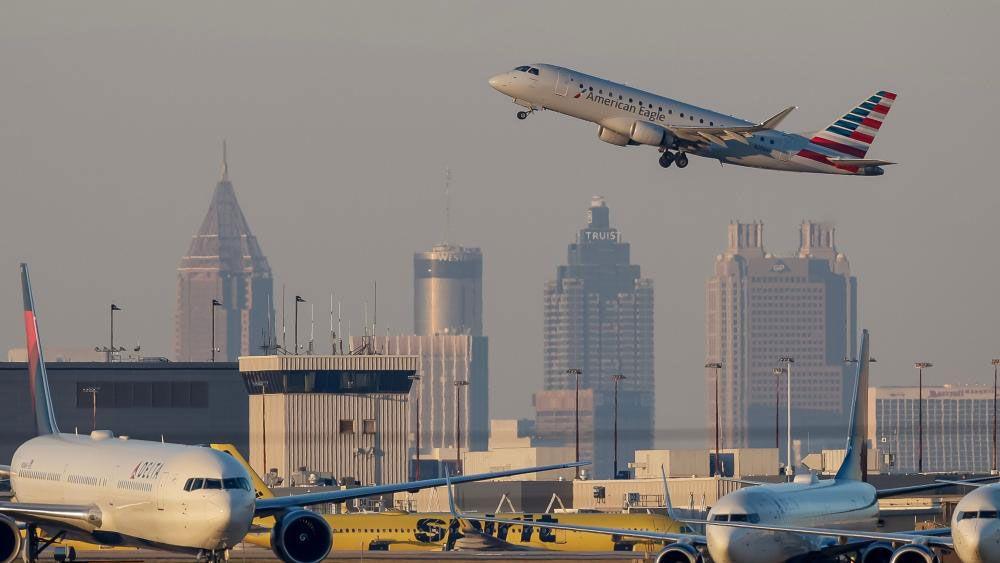 Hundreds of flights cancelled in US as airlines scramble to cut traffic during shutdown