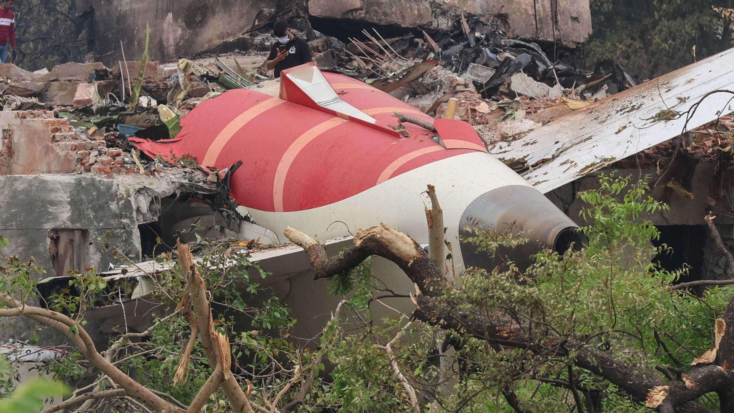 Indian PM Modi visits scene of plane crash, as search for black boxes continues