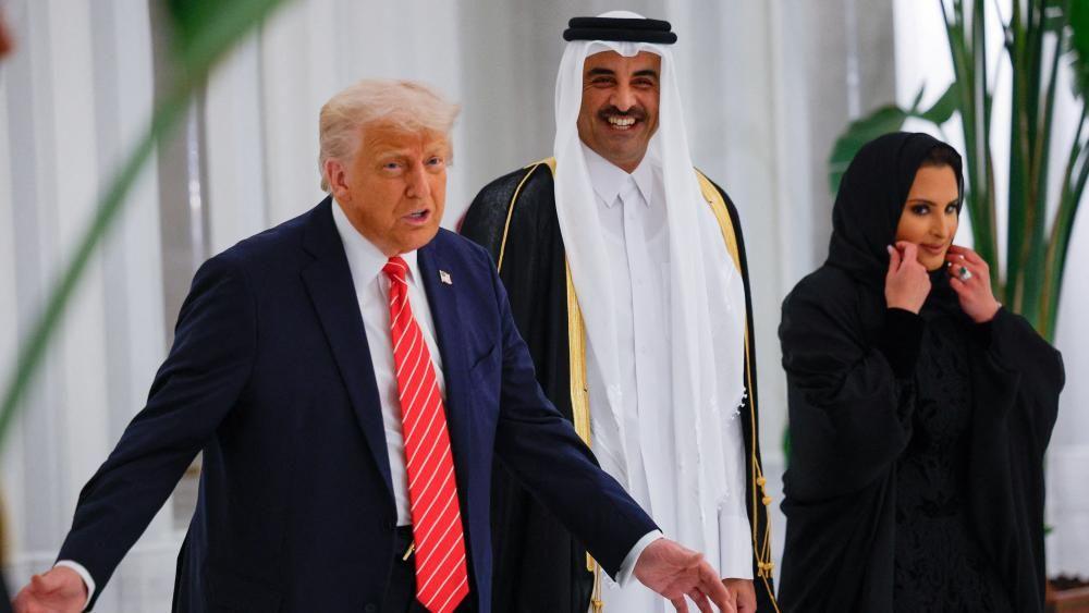 Trump attends Qatari state dinner after announcing deals on second day of Middle East tour