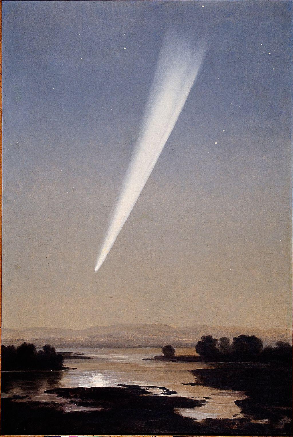 Cometa en el cielo reflejado en lago