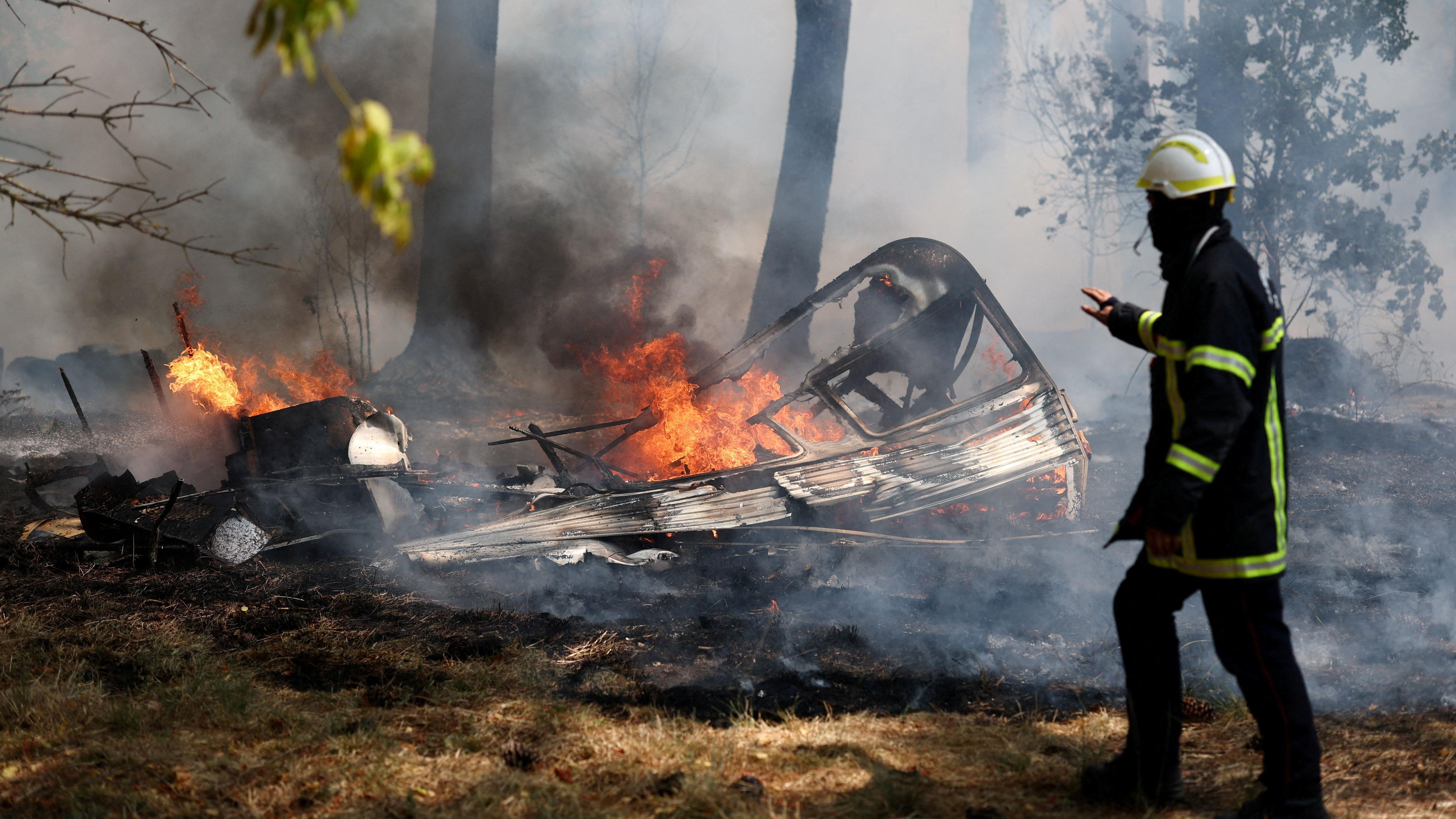Evacuations near Madrid as wildfires advance with thousands already fleeing French tourist spot