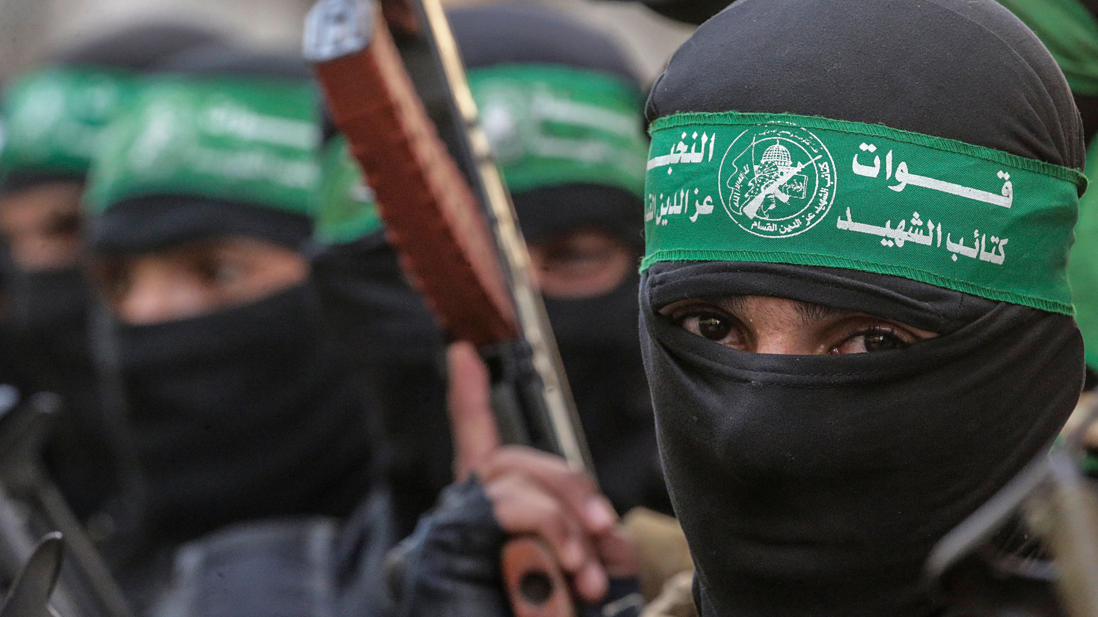 Fighters of the Al-Qassam Brigades, the military wing of Hamas, attend the funeral of late Hamas military commander Ghazi Abu Tamaa, head of Hamas's Administrative and Combat Support Staff, in Deir al-Balah refugee camp, southern Gaza Strip, on 4 February 2025