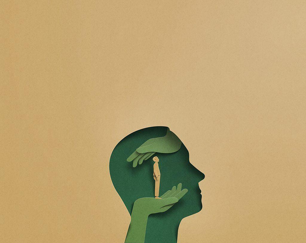 رسم لرأس لونه أخضر غامق وداخله يدان بلون أخضر أفتح وبين اليدين رجل لونه قريب للأصفر والخلفية لونها من درجات اللون الأصفر.