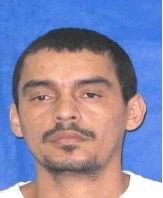 Retrato de Doca, no estilo 3x4; ele está com olhar sério