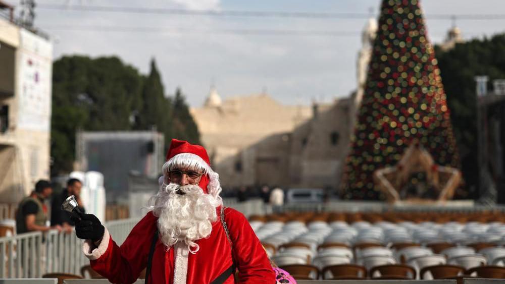Bethlehem Christmas tree lights up for first time since start of Gaza war