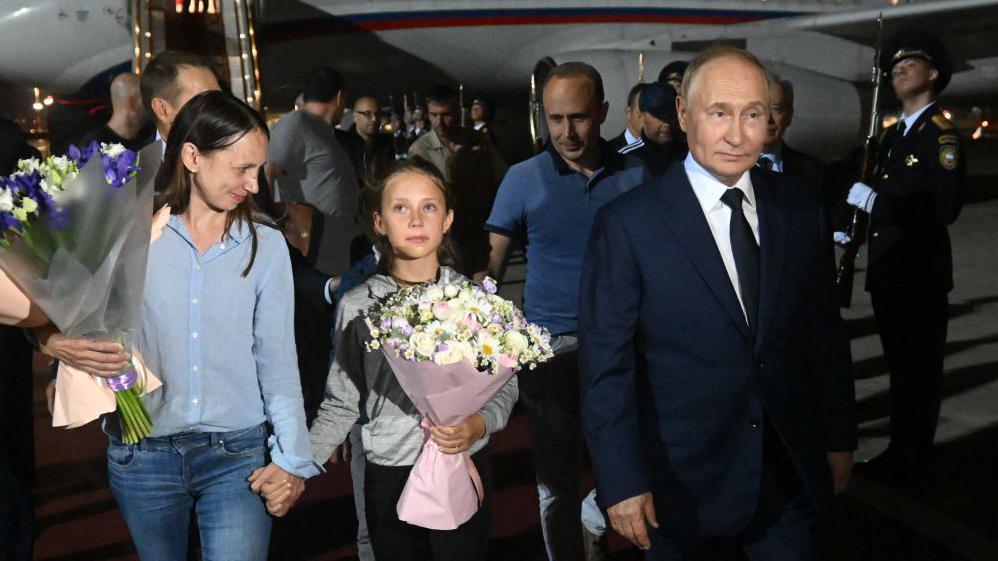 Anna Valerevna Dultseva, su hija y Vladimir Putin