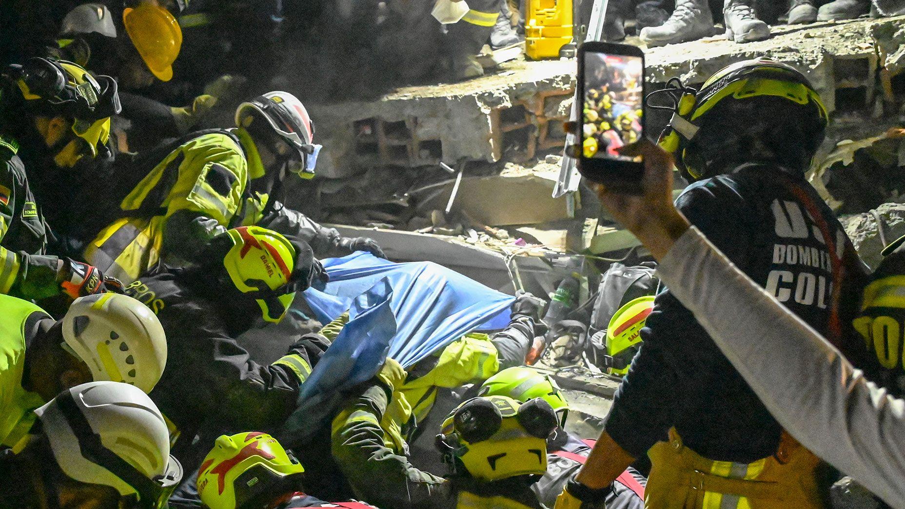 Woman pulled alive from rubble 36 hours after Colombia quake