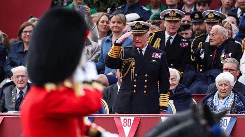 King salutes military procession as royals lead events marking 80 years since VE Day