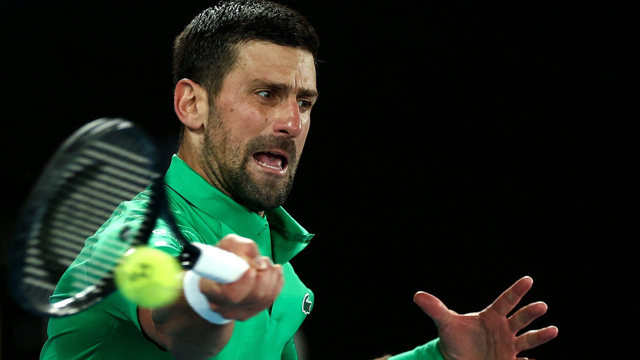 Australian Open final: Djokovic saves break points in fourth set against Alcaraz