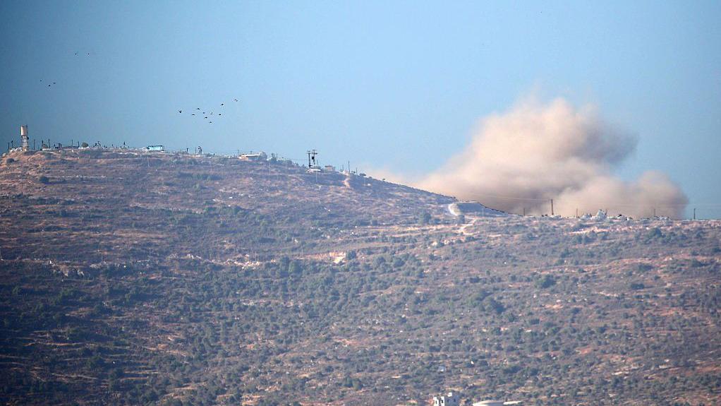 Iran and Israel say they will pause strikes but warn of retaliation if ceasefire breached again