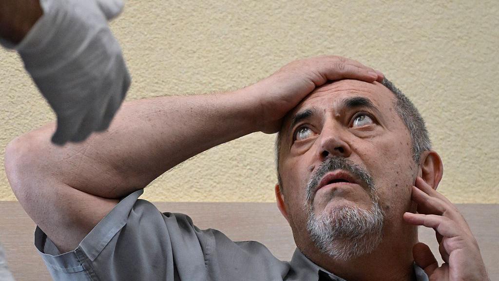One anti-war critic fined, another held as Russia clamps down on opponents