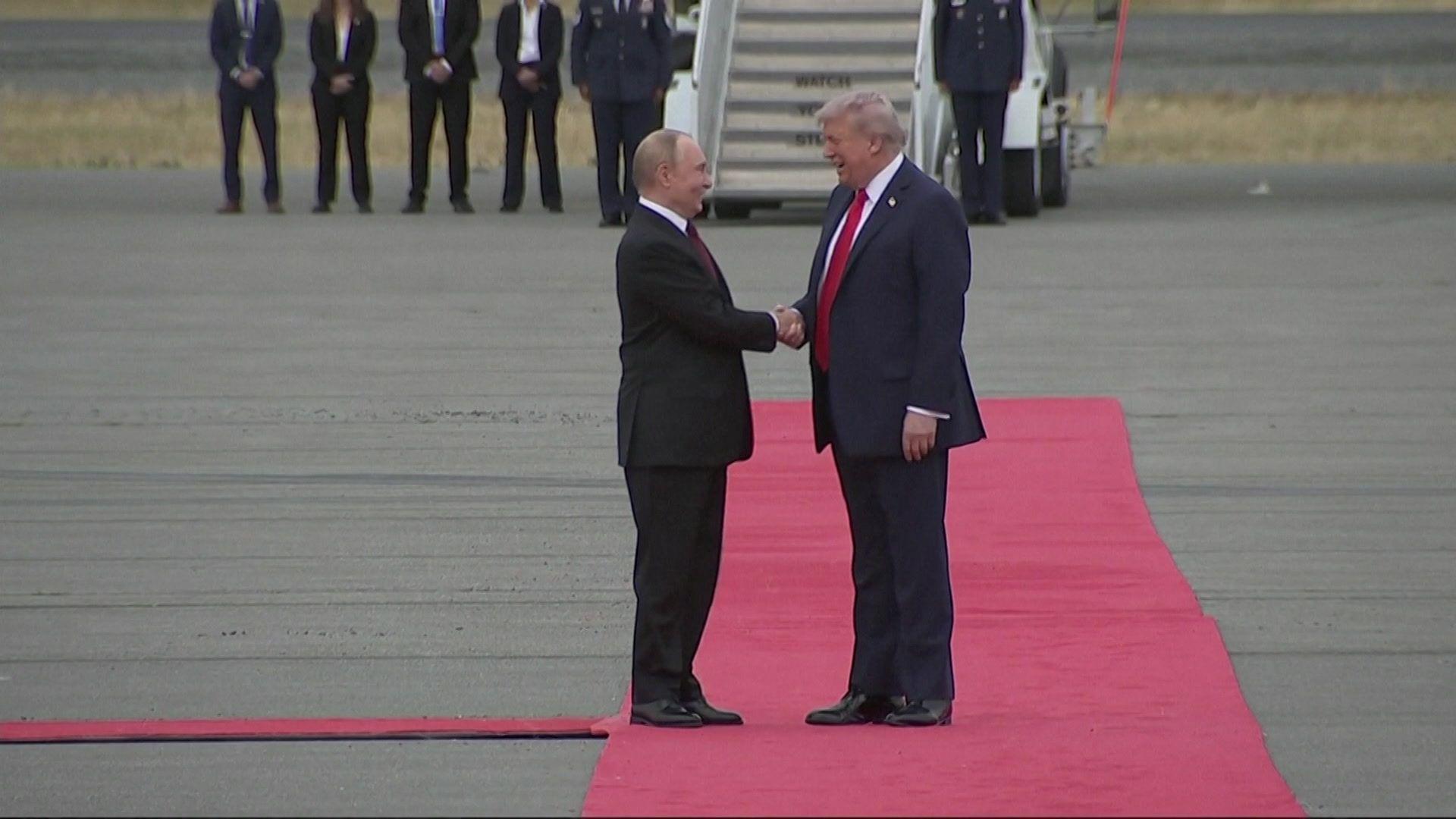 Trump and Putin greet each other with a handshake as they head for Ukraine talks in Alaska