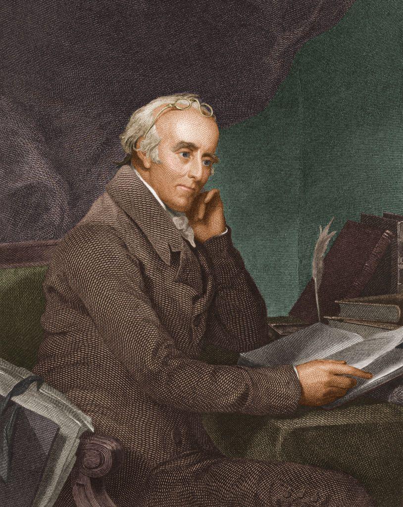 Una ilustración de Benjamin Rush, médico, sentado en su escritorio mirando un cuaderno.