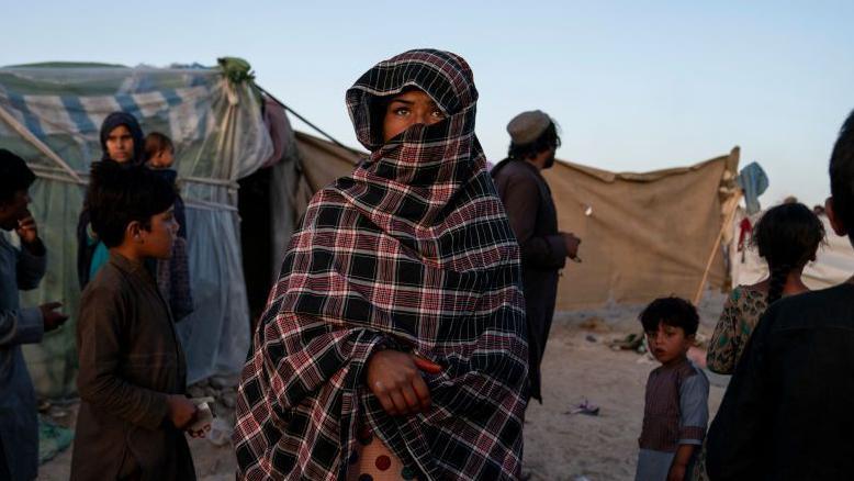 Afghan whose details were in UK data breach at risk from Taliban if deported, son tells BBC