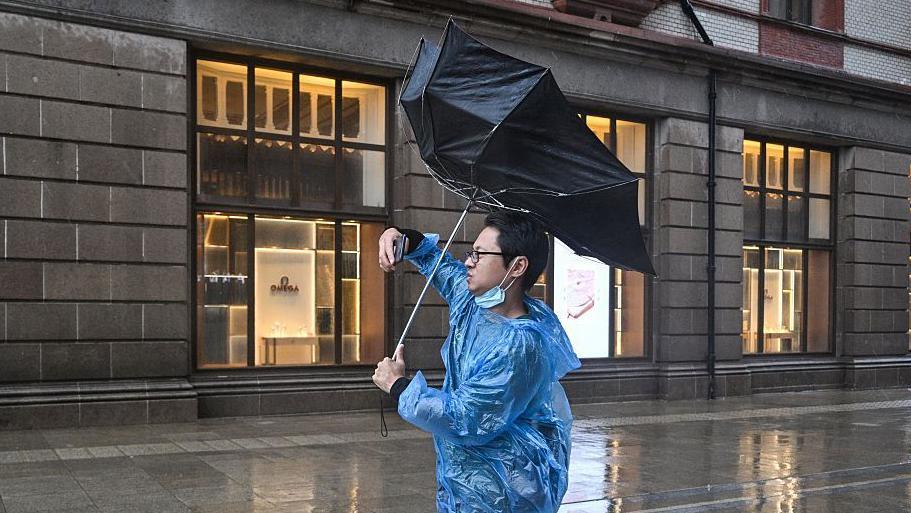 Three storms strike Asia in a week battering millions with heavy rain and strong winds